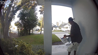 A man steals a package of a porch in Tampa.
